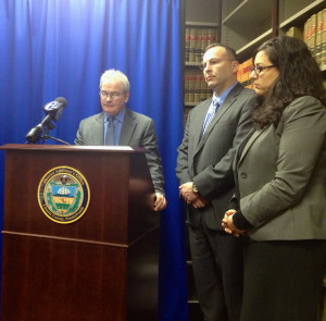 Chief Deputy District Attorney Patrick Carmody (left), with West Goshen Det. David Maurer and Assistant District Attorney Deborah S. Ryan, speaks to reporters after Morgan M. Mengel's sentencing.