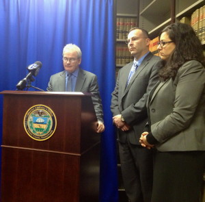 Chief Deputy District Attorney Patrick Carmody (left), with West Goshen Det. David Maurer and Assistant District Attorney Deborah S. Ryan, speaks to reporters after Morgan M. Mengel's sentencing.  