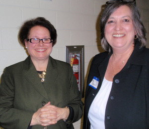 Julia Malloy-Good (left), a Family Court master, received congratulations from County Commissioner Kathi Cozzone after receiving the Democratic Party's endorsement for judge.