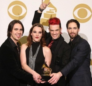 Joe Hottinger (left), a 2000 Unionville grad and member of the group Halestorm, accepts  a Grammy award for the song "Long Bites (So Do I). 