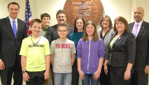 Participants in the third Food Check-Out, sponsored by the Chester Delaware County Farm Bureau, get recognition from County Commissioners Ryan Costello (left), Kathi Cozzone (third from right), and Terence Farrell (right). Susan Rzucidlo, who organized the project, is second from right.