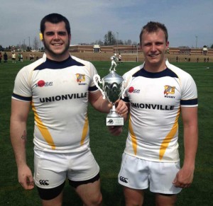 Ryan Ford & Chris Baker receive NC Youth Rugby Championship Trophy in Charlotte 