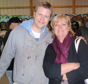 West Chester painter John Hannafin poses with April Margera, who served as chief hostess, bookkeeper, and bouncer on Tuesday night.