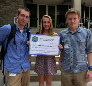 Unionville High students Alan Dembek (from left), Molly Basilio, and Adam Carl show off their second-place prize for "Chances of," a digital short movie.