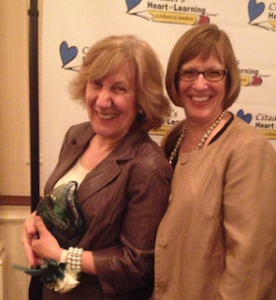 Unionville High French teacher Sue Shelley (left) celebrates with Principal Paula Massanari.