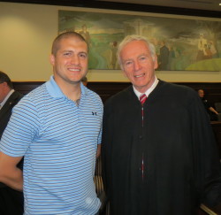 Chester County Senior Court Judge Thomas G. Gavin (left), who oversees Veterans Court, congratulates its newest graduate, Louis Freda II.