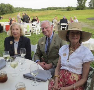 Marquerite (from left) and Gerry Lenfest take a few moments to sit on Saturday evening with Penny Watkins, a Natural Lands Trust board member.