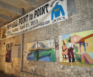 Paintings by Coatesville artist Dane Tilghman and steeplechase banners helped transform an aging city warehouse into an industrial chic venue for the Delaware Valley Point-to-Point Association’s annual awards party.