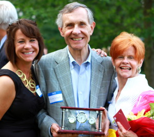 Frank Sobyak, the Chester County SPCA's board treasurer, poses with his daughter (from left), his Volunteer of the Year Award, and his wife, 