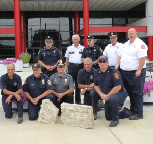 County first-responders pose with the Pentagon 9/11 artifacts