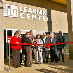CCIU administrators and state officials cut the ribbon at the new Learning Center.