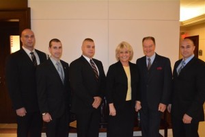 By Kathleen Brady Shea, Managing Editor, The Times In a Chester County courtroom packed with supporters at the Justice Center, a veteran member of local law-enforcement was sworn in Monday morning as chief deputy in the Sheriff’s Office, and on Monday afternoon, four new sheriff’s deputies took their oaths of office. For Chief Deputy Sheriff George P. March, a Caln Township resident, the ceremony brought his career full circle, returning him to Chester County, where his jobs have included a criminal investigator for the state police at the Embreeville barracks and chief county detective. Although March had numerous jobs outside the county, he never moved from the county, sometimes commuting as far away as Harrisburg. March said he had been prepared to retire after spending the past 14 years as the chief information officer for RISS, a law-enforcement intelligence network serving local, state, and federal agencies within as well as outside the U.S. Then he ran into Chester County Sheriff Carolyn “Bunny” Welsh, who was looking to fill the vacancy left by Chief Deputy James O. Moyer, who passed away in January. Addressing the standing-room-only crowd Monday morning, Welsh said she was thrilled that March agreed to take the position. She explained that the chief deputy or “under sheriff,” as it is called in many jurisdictions, is vital to the command structure and the organization of the Sheriff’s Office. “It is a position that requires leadership, commitment, dedication and integrity,” she said. “George March exemplifies those qualities and more.” Welsh pointed out that March enjoys outstanding relationships with law enforcement agencies throughout Pennsylvania and beyond, an assessment exemplified by the many troopers and detectives in attendance. “He is highly-regarded and well-respected at every level of law enforcement,” she said. “He brings those relationships and that respect to the position of Chief Deputy Sheriff.” March was sworn in by Chester County Court Judge Anthony A. Sarcione, who, when he formerly served as District Attorney, hired March as Chester County’s chief detective in 1998. The new deputy sheriffs - Kevin Leary, Michael Clark, Benjamin Tobin, and Andrew Kline -