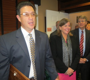 CVC Board President Jose Reyes (from left) explains the background of the John J. Crane Award as Elizabeth B. Pitts and Joseph W. Carroll listen.