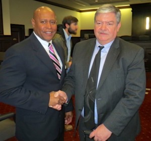 Chester County Det./Lt. Kevin Dykes congratulates retired Coatesville Det. Marty Quinn on his selection as 2013 Law Enforcement Officer of the Year.