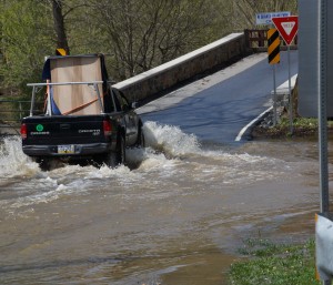 The driver of this truck was likely eager to get to higher ground on the Northbrook Bridge.