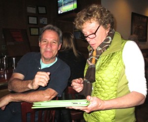 Jack Marshall (left) listens as Barbara Forney makes sounds adjustments during a performance by Jack’s Fault at La Verona Restaurant in Kennett Square.