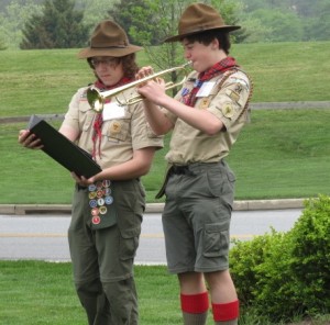 Fellow Boy Scout Zachary Powell (left) holds the music as Harrison Warren plays “America the Beautiful” at the Indian Hannah rededication ceremony at Longwood Gardens.