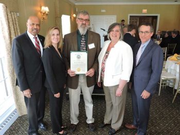J. Larry Boling Award Recipient Rick Smith (center), East Goshen Township with County Commssioners Terence Farrell, Michelle Kichline, Kathi Cozzone, and CCCBI President & CEO, Guy Ciarrocchi.