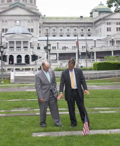 Rep. Steve Barrar (R-160) listens as Rep. Mark Gillen (R-128) explains the updates that would be made to Soldiers’ Grove to honor the heroes who sacrificed their lives defending our country as a result of House Bill 1484.