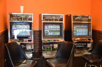 Three alleged gambling machines found by authorities at a Kennett Square store, led in part to the arrest of three, related to gambling charges there and at another location in Oxford.
