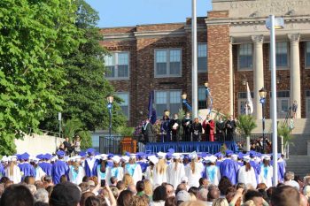 In keeping with long tradition, Kennet High graduates entered the ceremony down the school's front steps, as everyone enjoyed the perfect weather, Friday evening.