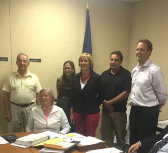 Left to Right: Supervisor Bob Weer, Township Manager Jane Laslo, Supervisor Christine Kimmel, Asst. Township Manager Laurie Prysock, Supervisor John Sarro, and Supervisors' chair Richard Hannum (Supervisor Eddie Caudill was not present ) celebrate the retirement of Laslo — after nearly 40 years of service — and the appointment of Prysock as her replacement this fall.