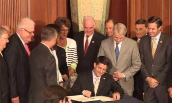 Congressman Pat Meehan looks on as Speaker Paul Ryan (R-WI) signs the Comprehensive Addiction and Recovery Act to send it to the President’s desk on Thursday.