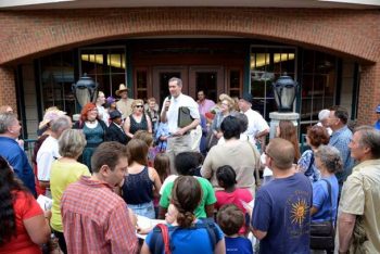 The 2015 Murder mystery art stroll, compliments of Historic Kennett Square (Chris Ramsay is pictured speaking to the gathered detectives).