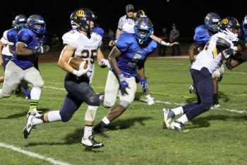 Unionville's Jack Adams races for the endzone — a play that gave the Indians a second half lead. Jim Gill photo.