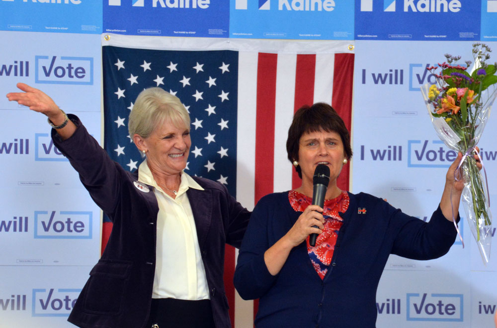 West Chester Mayor Carolyn Comitta shares a moment with Anne Holton, wife of Democratic Vice Presidential nominee Tim Kaine during a voter registration event Saturday.