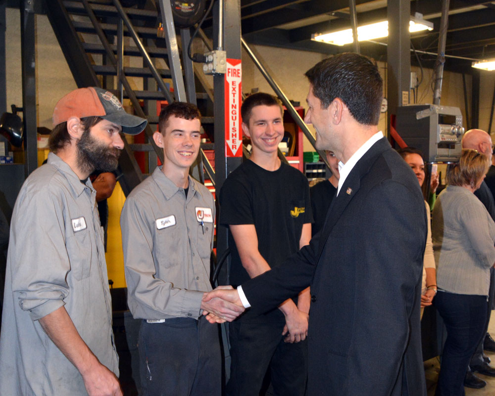 Paul Ryan speaks with J-Tech employees following an event with U.S. Rep. Ryan Costello, Thursday.