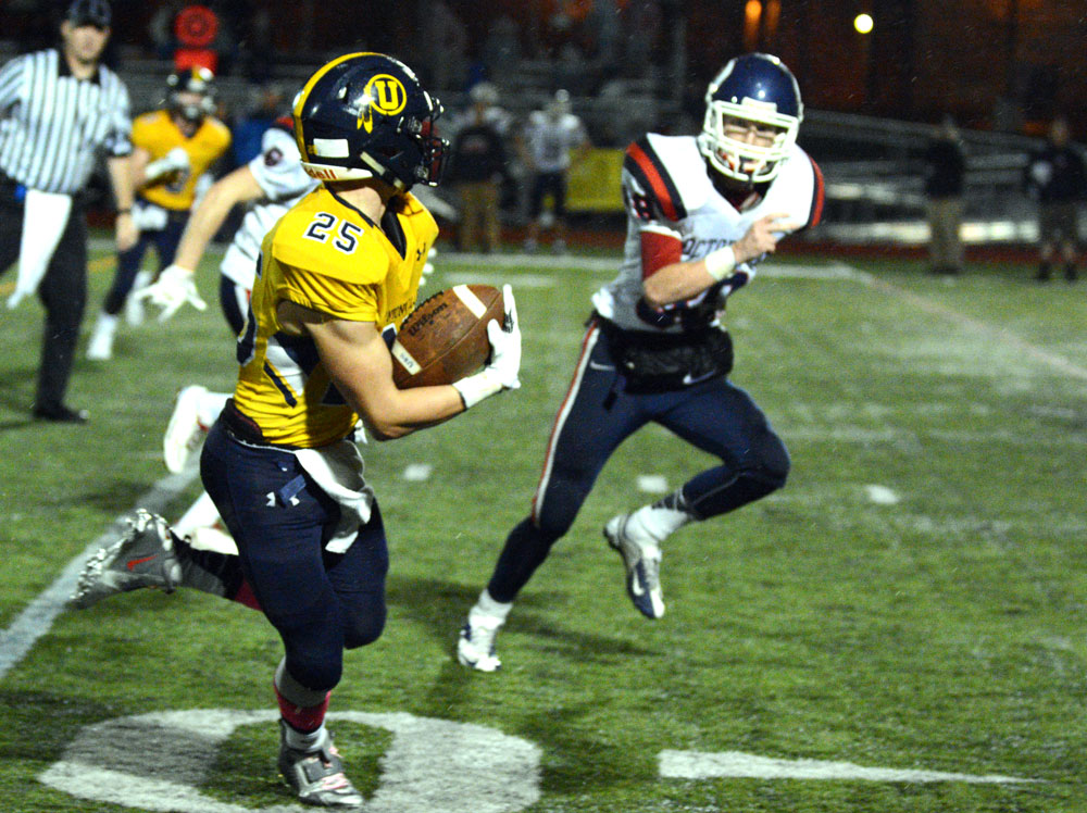 Unionville's Jack Adams races up the right sideline. Adams scored a pair of TDs in the Indians' 25-7 win, Friday night. Alex Castina photo.