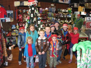 64th Brandywine Otter Scouts at the Giving Tree. L-R: Riley Pacienza, Kyra Perkins, Corrine Perkins, Zane Page, Nicoli Morgan, Sara Ball, Samuel Castelo, Timberwolf Dylan Ball, Julian Hontz, Alex Chase, Carolyn Williams, and Assistant Otter Leader Rich Morgan.