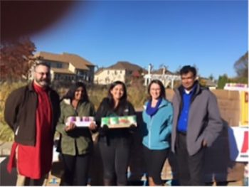 Pictured are Zachary Ruff, Dean of STEM Academy; Manasvi Pannala, volunteer; Sana Tipnis, volunteer; Kate Miller, Nutrition Services Manager at Kennett Food Cupboard; and Pannala Reddy, major donor for the Diwali Food Drive at Eagle Village.
